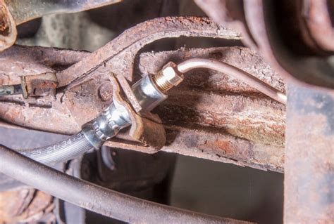 metal box with brake lines coming out|fix rusted brake line.